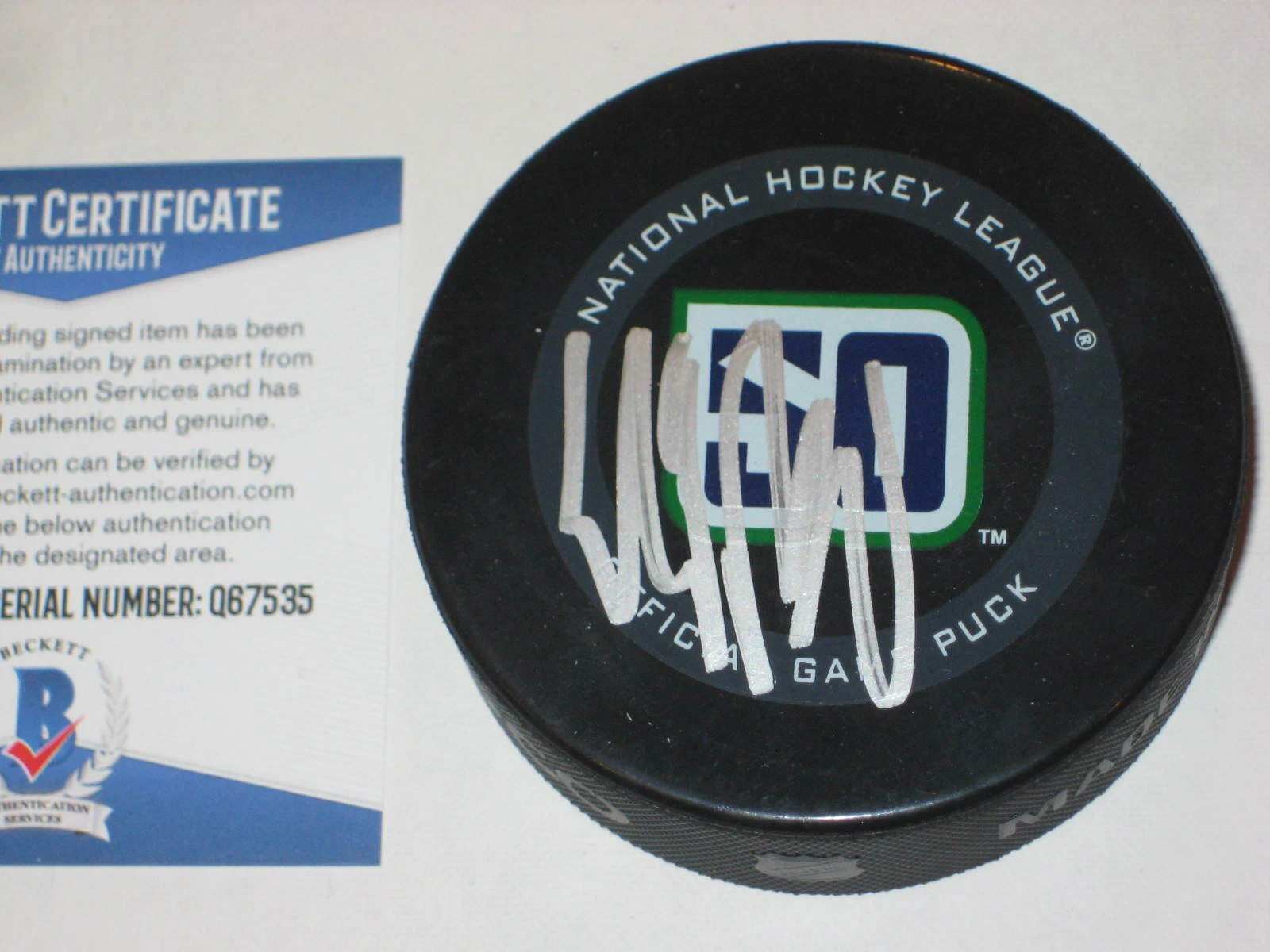 ELIAS PETTERSSON Signed CANUCKS 50th ANNIV. Official GAME Puck w/ Beckett COA