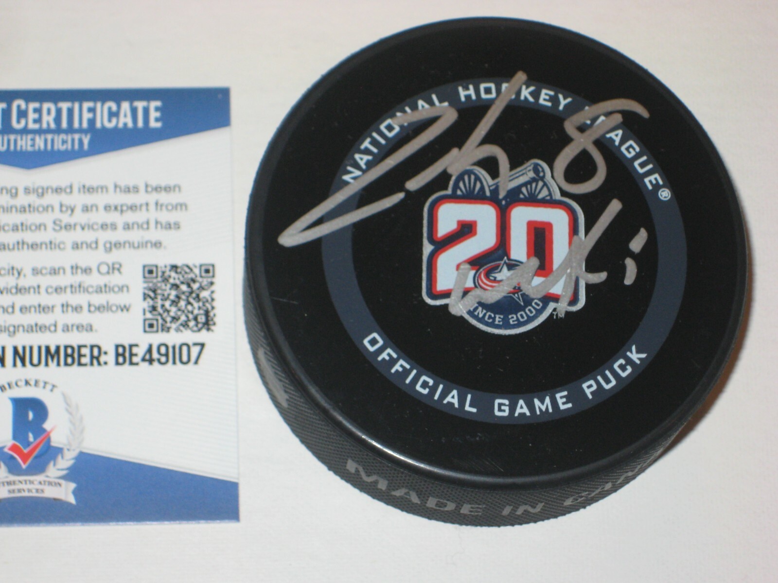 ZACH WERENSKI SIGNED COLUMBUS 20TH ANNIV. OFFICIAL GAME PUCK W/ BECKETT COA COLLECTIBLE MEMORABILIA