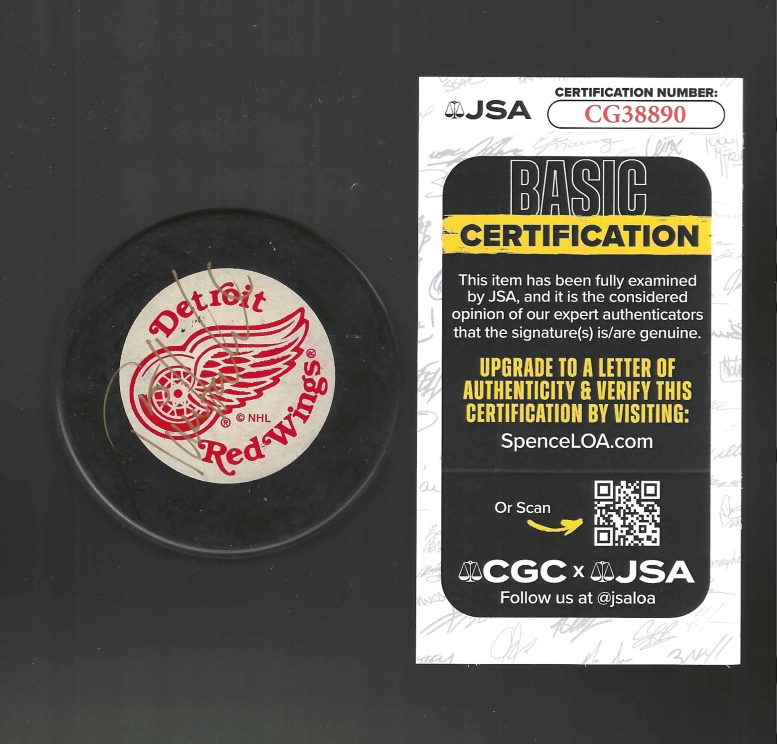 Tomas Holmstrom Signed Detroit Red Wings Trench Puck JSA COA