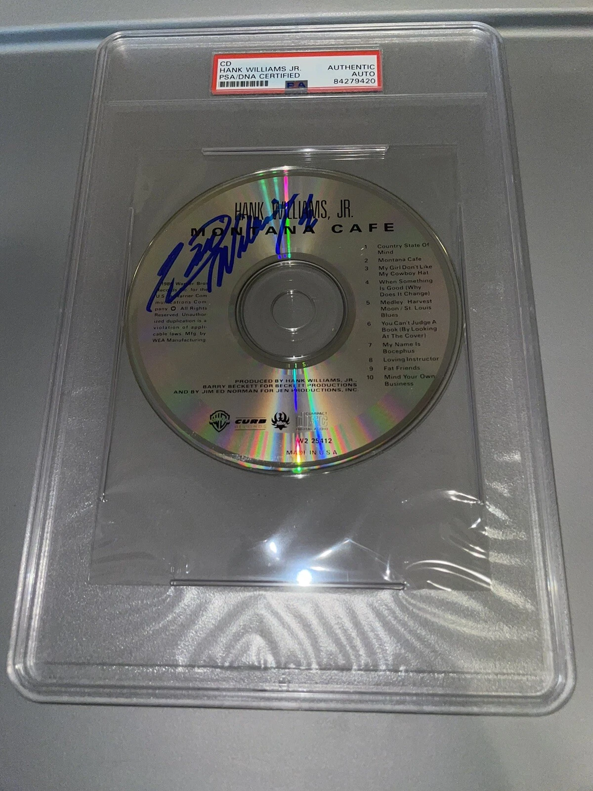 Hank Williams Jr Signed Montana Cafe CD Slabbed By PSA/DNA