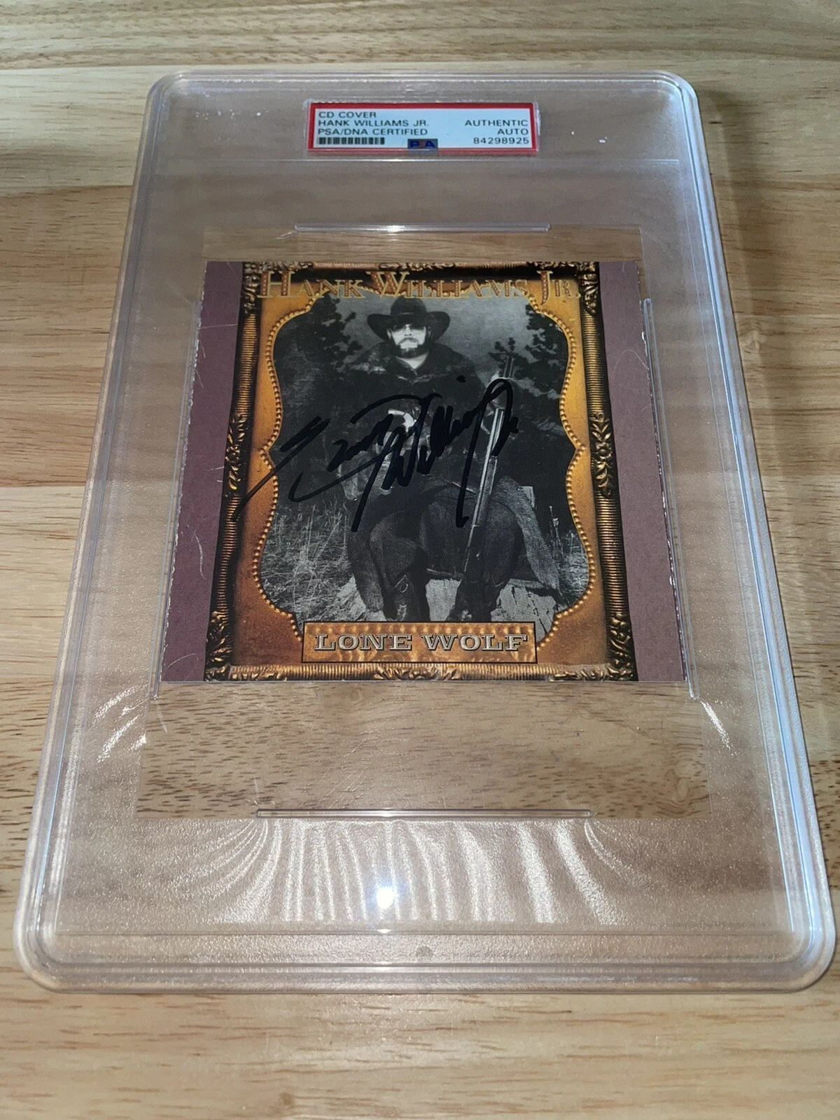 Hank Williams Jr Signed Lone Wolf CD Booklet Slabbed PSA/DNA
