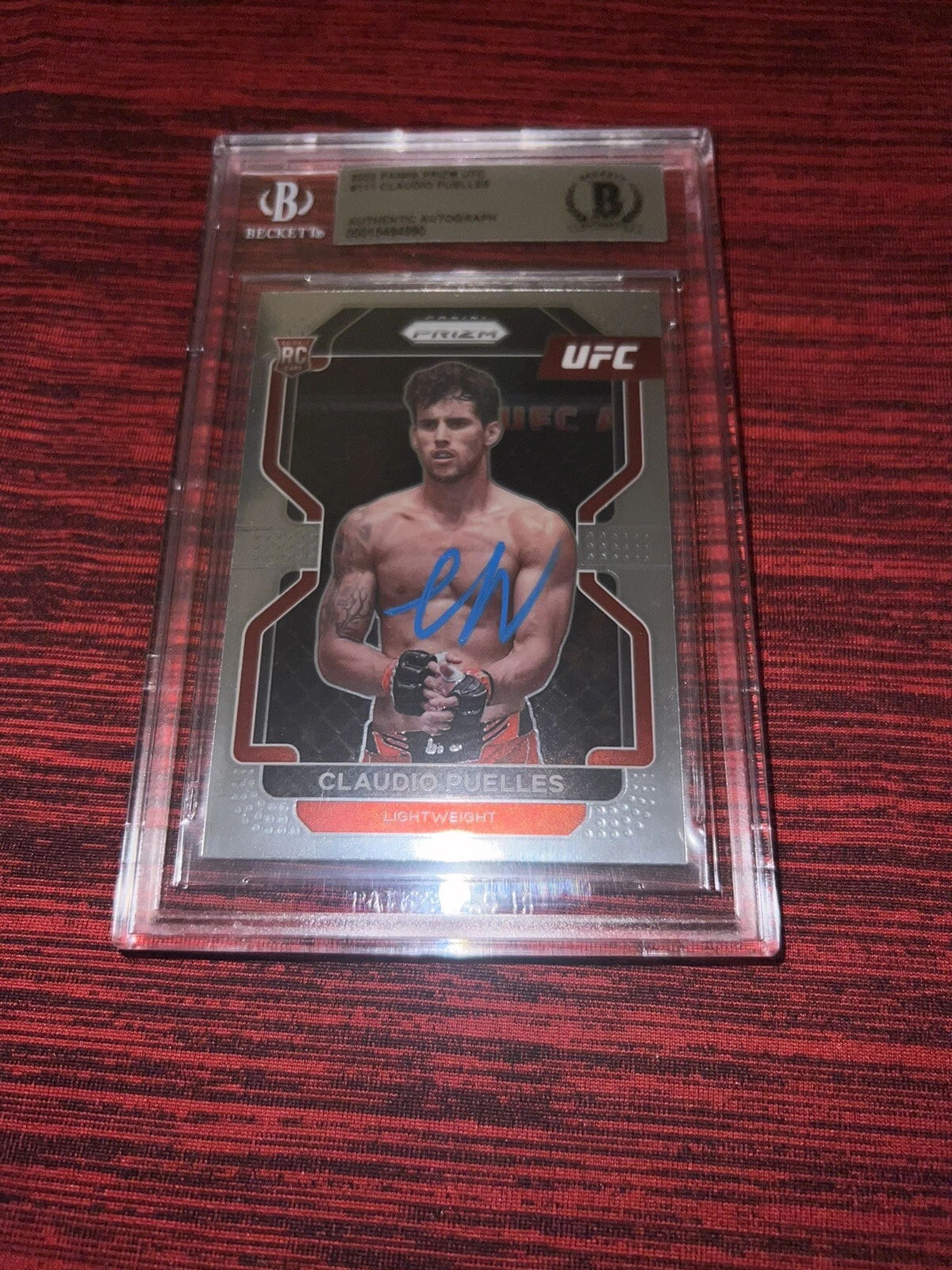 Claudio Puelles Signed 2022 Panini Prizm UFC Trading Card Champ Beckett