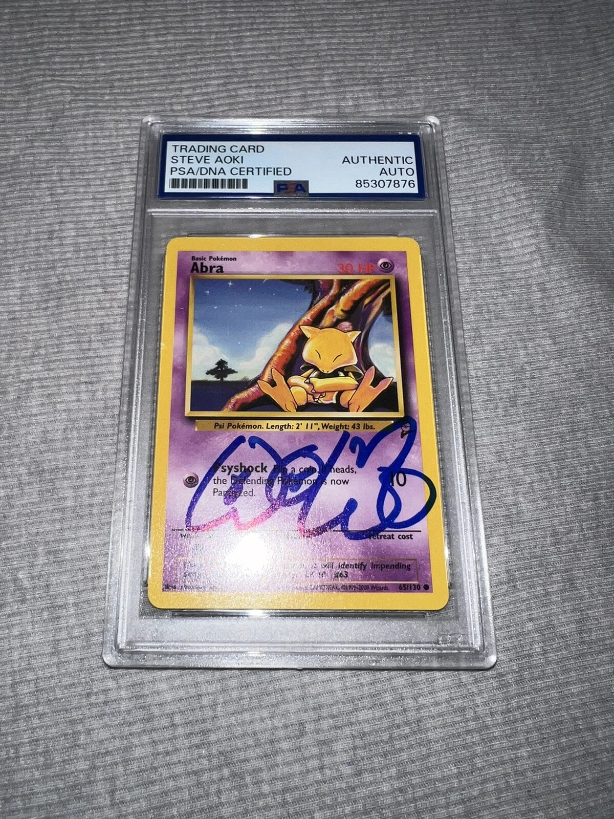 Steve Aoki Signed Official Pokemon Trading Card Base Set 2 Abra PSA/DNA