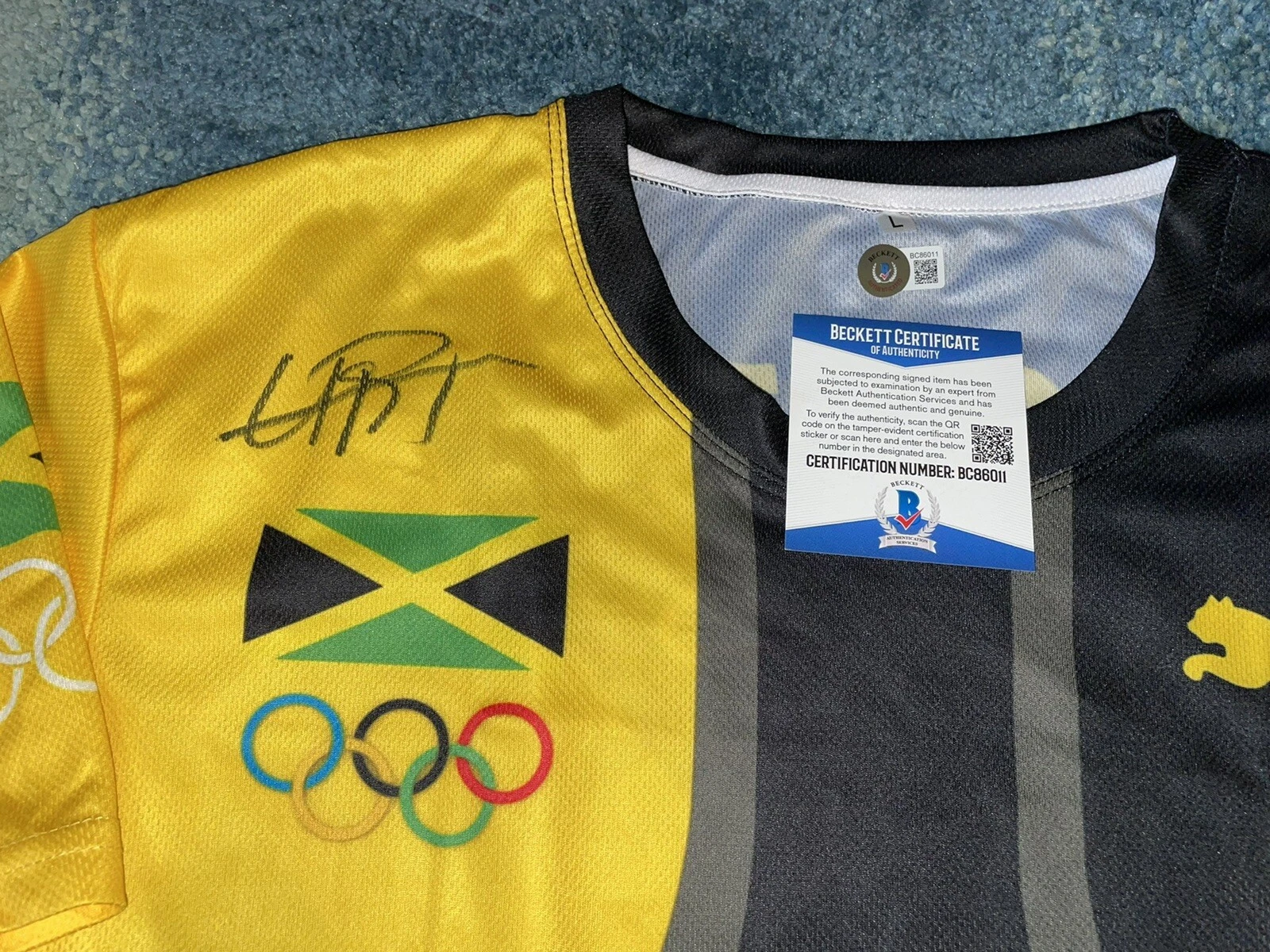 Usain Bolt Signed Puma Rio Olympics Jersey Gold Medal 8x Jamaica Beckett #12