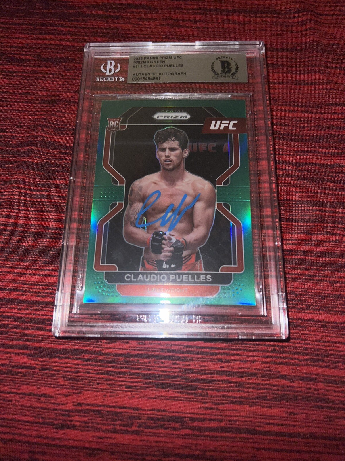 Claudio Puelles Signed 2022 Panini Prizm UFC Trading Card Green Champ Beckett