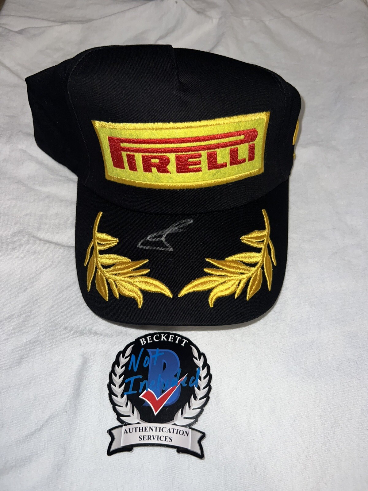 Oliver Bearman Signed Pirelli Podium Hat F1 Star Ferrari Haas Rookie Beckett #5