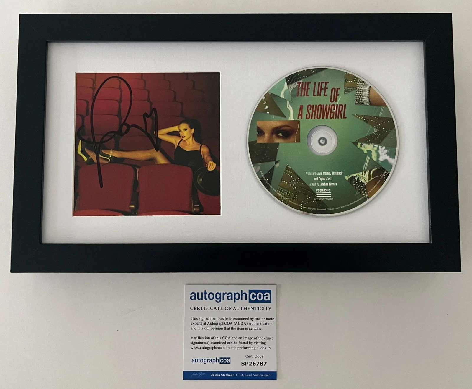 TAYLOR SWIFT SIGNED THE LIFE OF A SHOWGIRL FRAMED & MATTED CD A & AUTOGRAPH COA