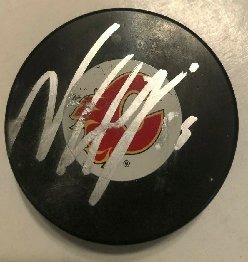 NOAH HANIFIN SIGNED CALGARY FLAMES PUCK W/CASE COA