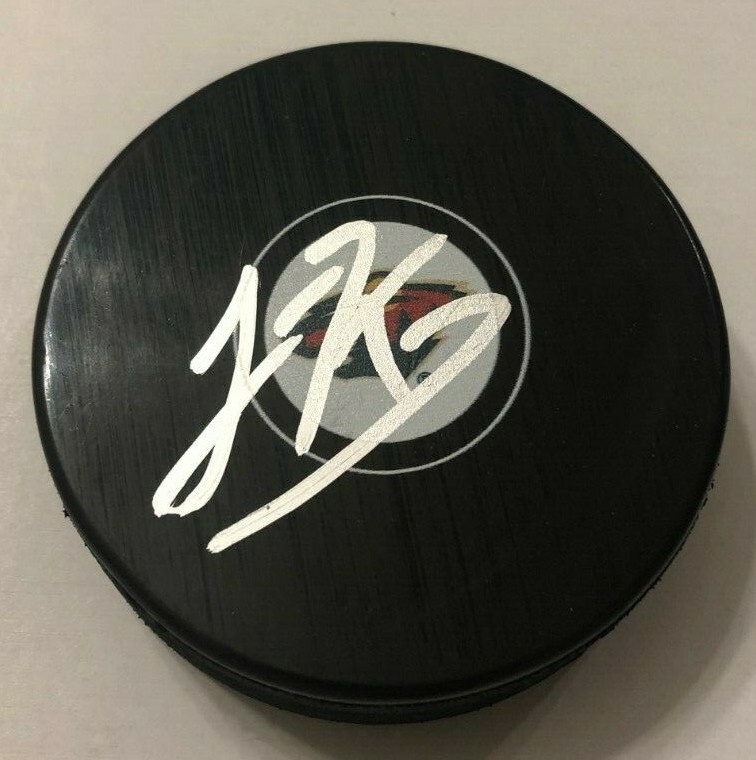 LUKE KUNIN SIGNED MINNESOTA WILD HOCKEY PUCK W/ CASE COA