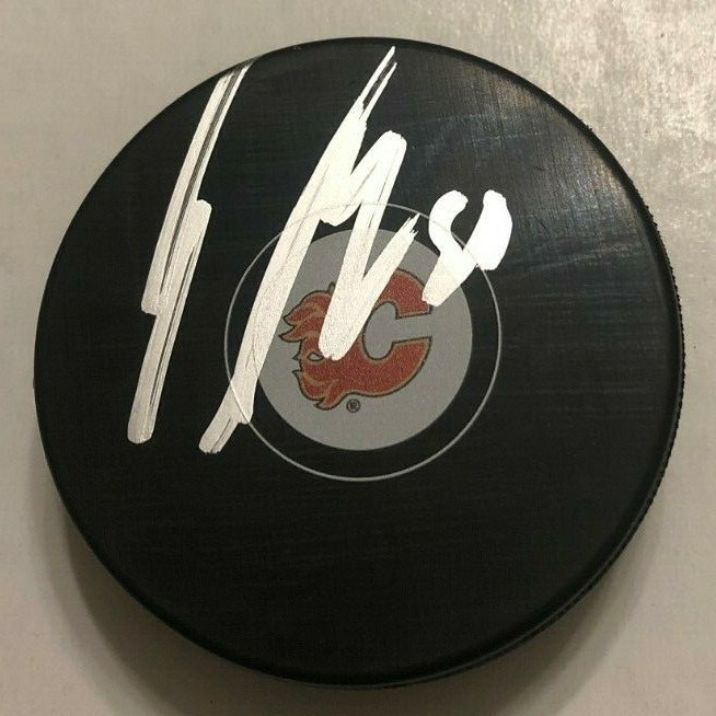 NOAH HANIFIN SIGNED CALGARY FLAMES HOCKEY PUCK W/ CASE COA