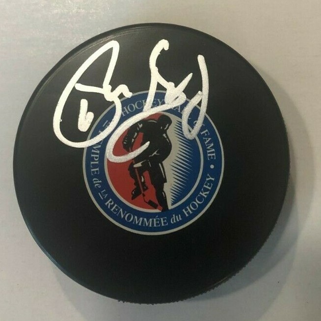 PHIL HOUSLEY SIGNED HOCKEY HALL OF FAME PUCK W/ CASE SABRES FLAMES JETS COA