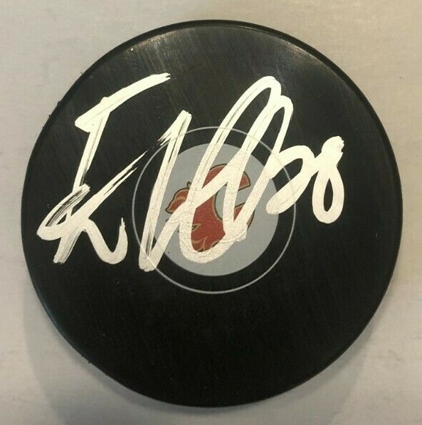 ELIAS LINDHOLM SIGNED CALGARY FLAMES HOCKEY PUCK W/ CASE COA