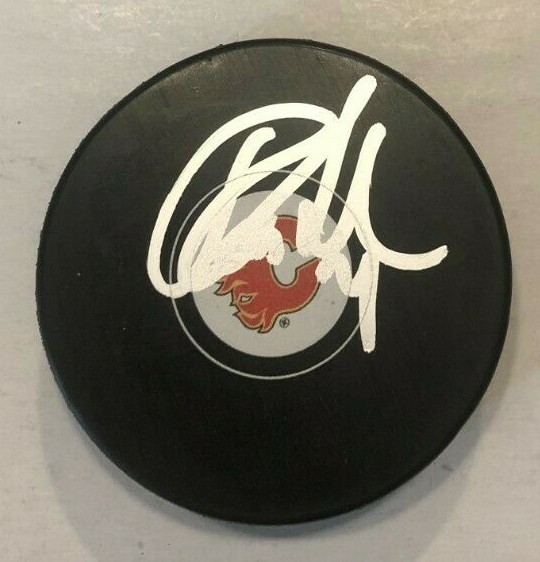 RASMUS ANDERSSON SIGNED CALGARY FLAMES HOCKEY PUCK W/ CASE COA
