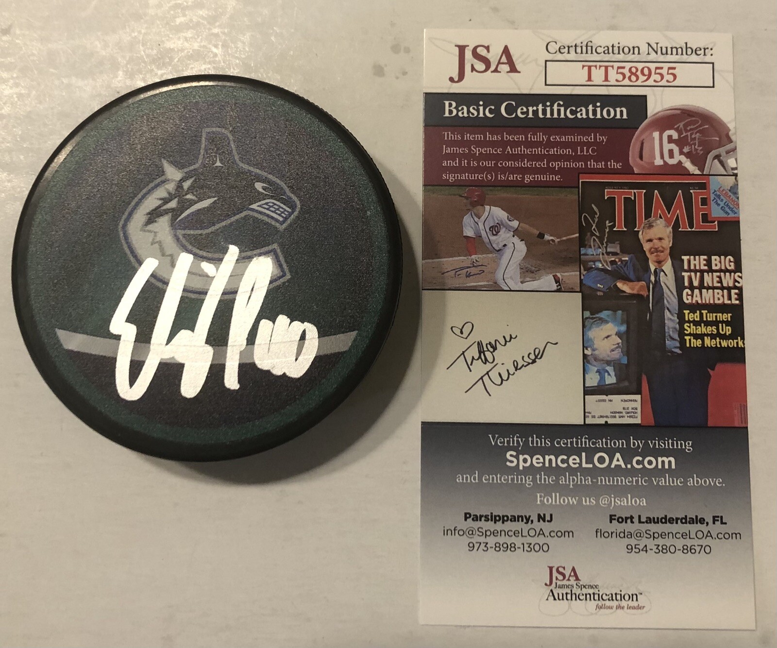 ELIAS PETTERSSON SIGNED VANCOUVER CANUCKS REVERSE RETRO HOCKEY PUCK W/ CASE JSA