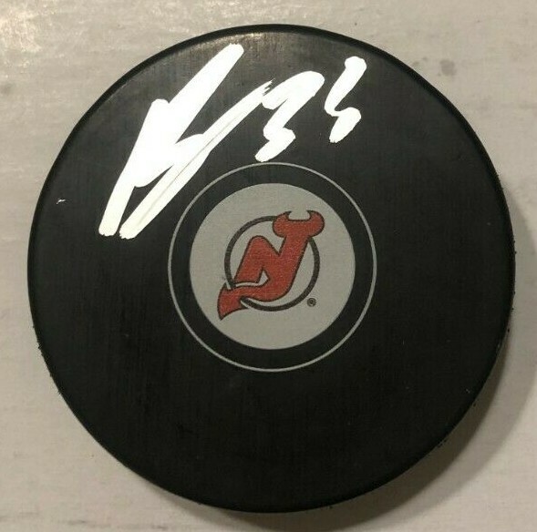 RYAN GRAVES SIGNED NEW JERSEY DEVILS HOCKEY PUCK W/ CASE COA