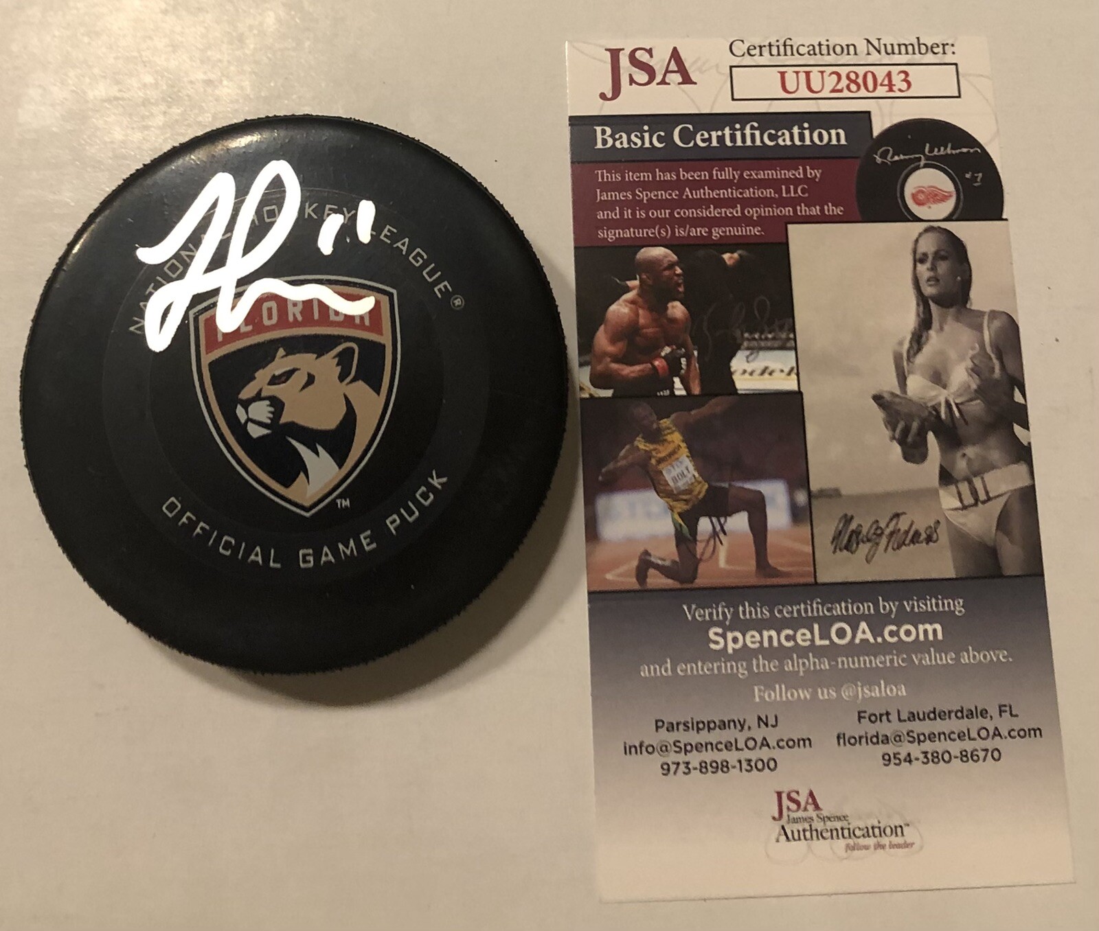 JONATHAN HUBERDEAU SIGNED FLORIDA PANTHERS OFFICIAL GAME PUCK W/ CASE JSA COA