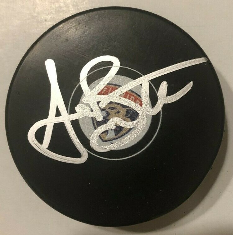 ANDREW BRUNETTE SIGNED FLORIDA PANTHERS HOCKEY PUCK W/ CASE COA
