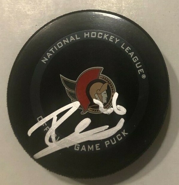 ERIK BRANNSTROM SIGNED OTTAWA SENATORS OFFICIAL GAME HOCKEY PUCK W/ CASE COA