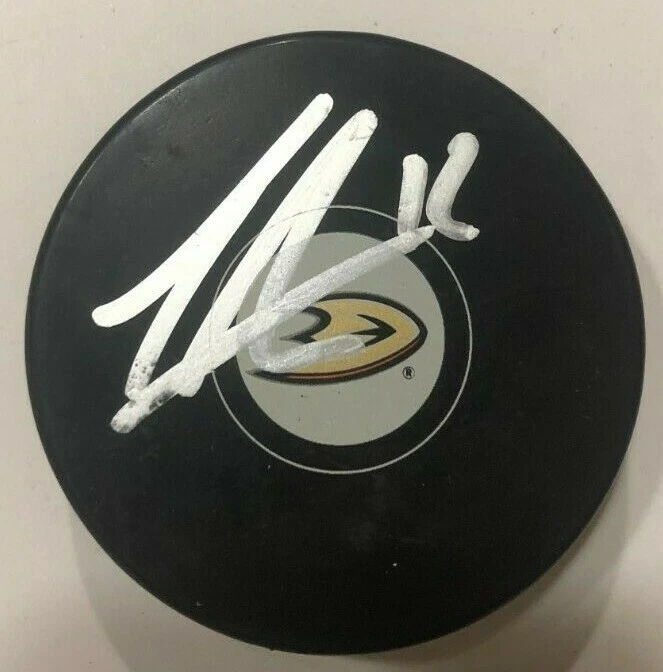 SONNY MILANO SIGNED ANAHEIM DUCKS HOCKEY PUCK W/ CASE COA