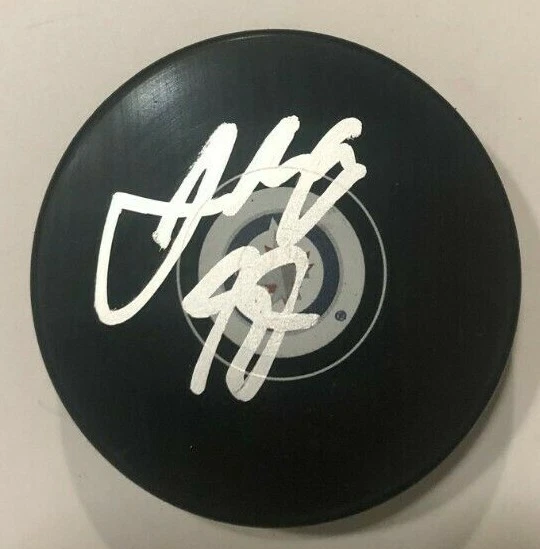 JOSH MORRISSEY SIGNED WINNIPEG JETS HOCKEY PUCK W/ CASE COA