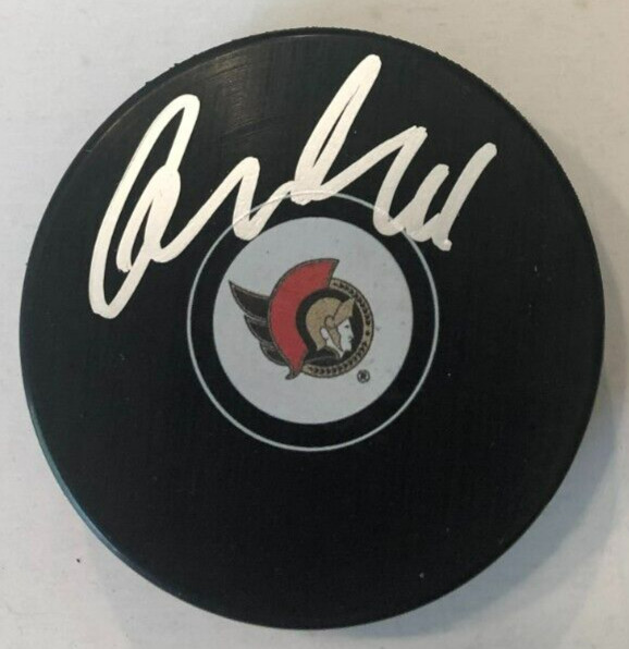 DERICK BRASSARD SIGNED AUTOGRAPHED OTTAWA SENATORS HOCKEY PUCK W/ CASE COA