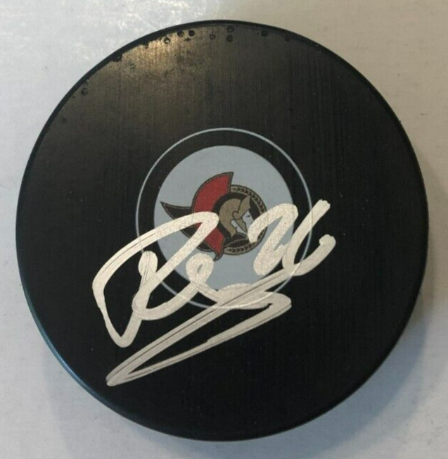 ERIK BRANNSTROM SIGNED AUTOGRAPHED OTTAWA SENATORS HOCKEY PUCK W/ CASE COA
