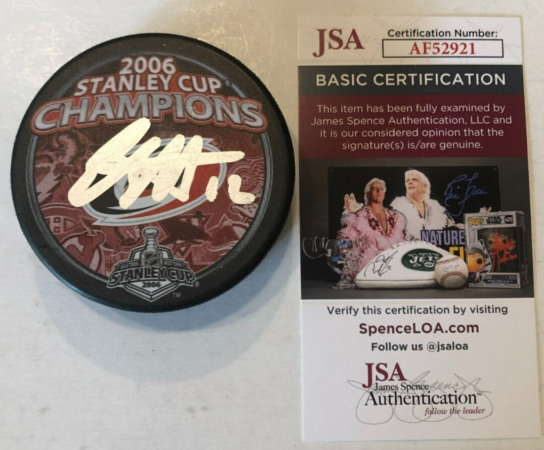 ERIC STAAL SIGNED CAROLINA HURRICANES 2006 STANLEY CUP PUCK W/ CASE JSA COA