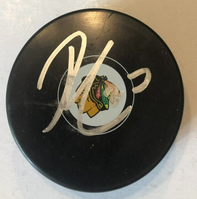 LUKAS REICHEL SIGNED AUTOGRAPHED CHICAGO BLACKHAWKS HOCKEY PUCK W/ CASE COA
