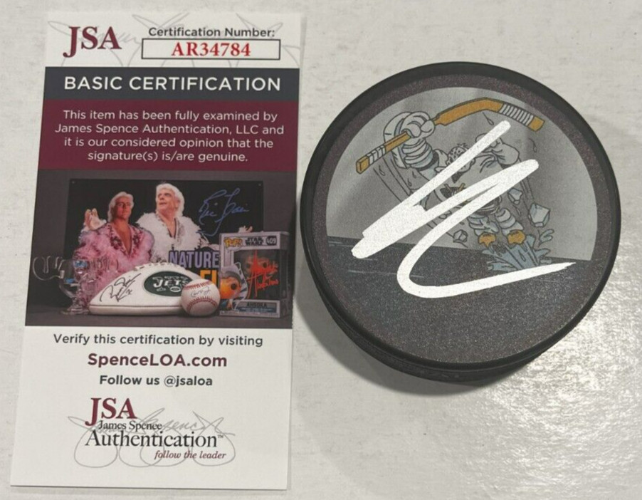 LEO CARLSSON SIGNED ANAHEIM DUCKS HOCKEY PUCK W/ CASE JSA COA