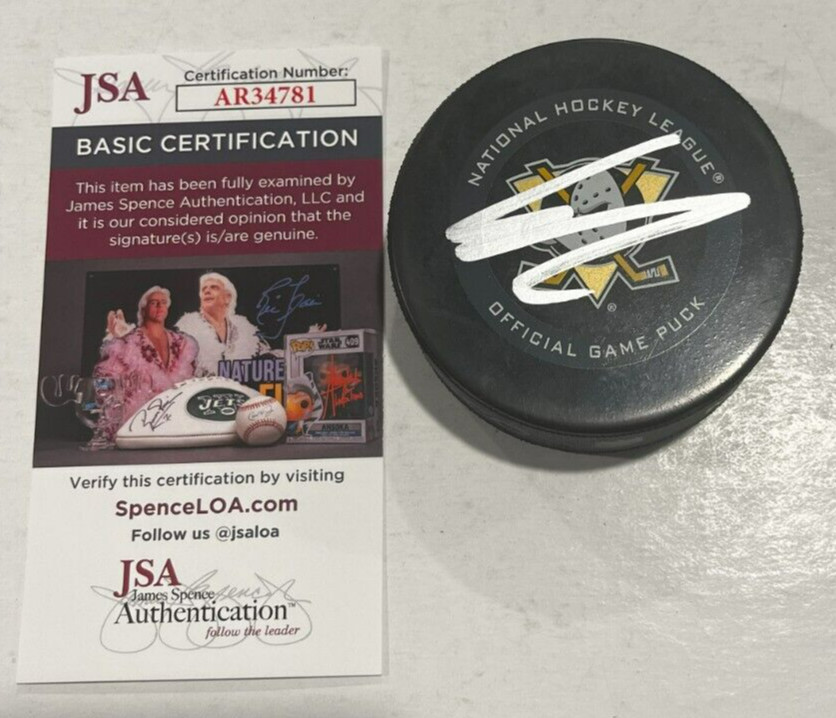 LEO CARLSSON SIGNED ANAHEIM DUCKS OFFICIAL GAME HOCKEY PUCK W/ CASE JSA COA