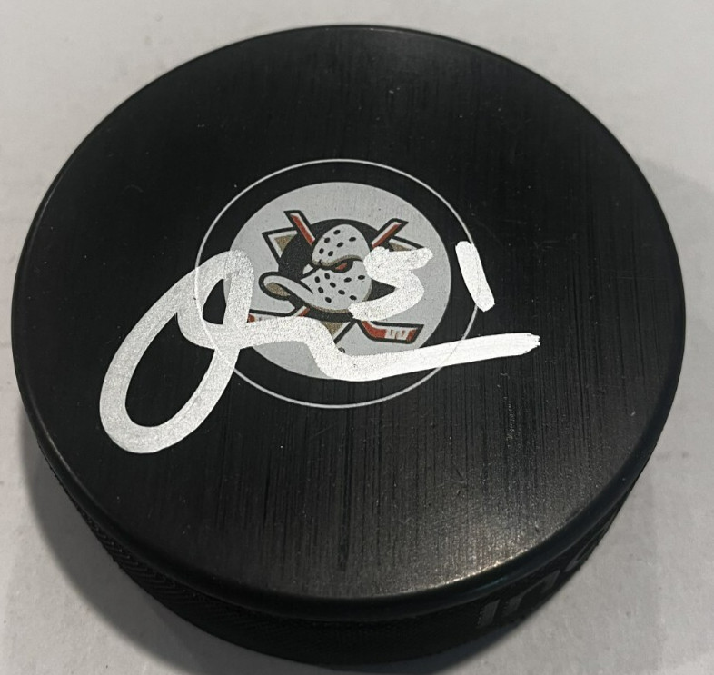 OLEN ZELLWEGER SIGNED ANAHEIM DUCKS HOCKEY PUCK W/ CASE COA