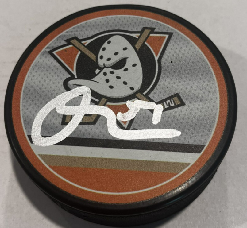 OLEN ZELLWEGER SIGNED ANAHEIM DUCKS HOCKEY PUCK W/ CASE COA