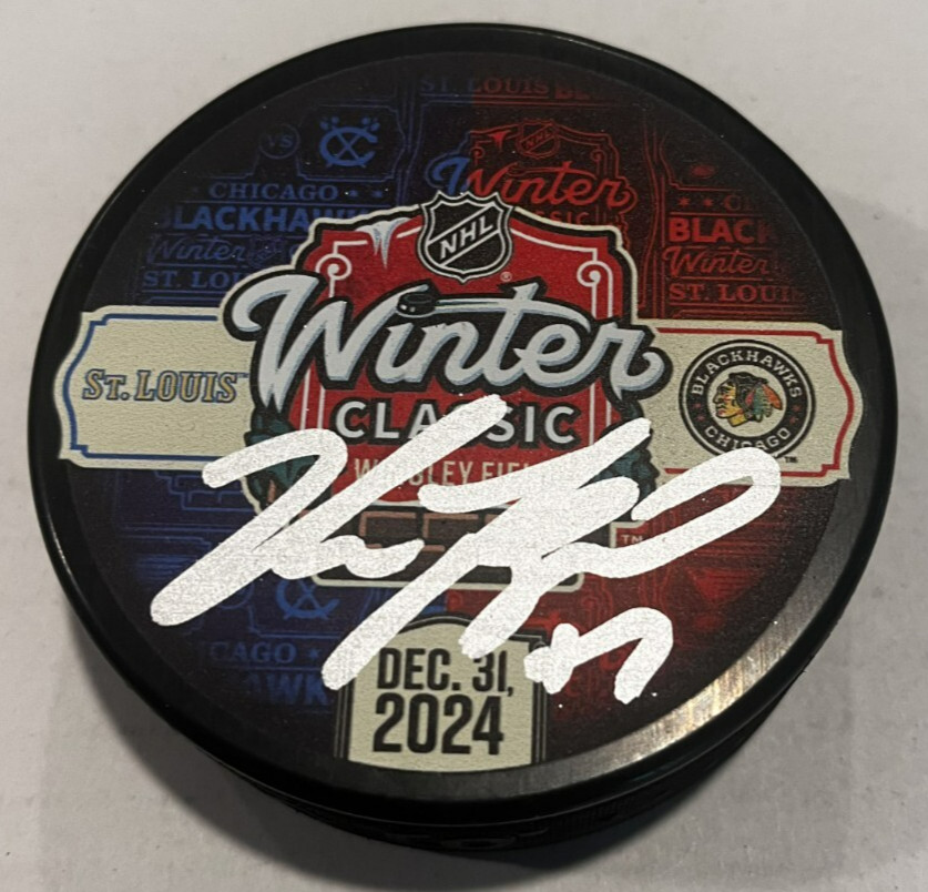NICK FOLIGNO SIGNED CHICAGO BLACKHAWKS 2024 WINTER CLASSIC PUCK W/ CASE COA