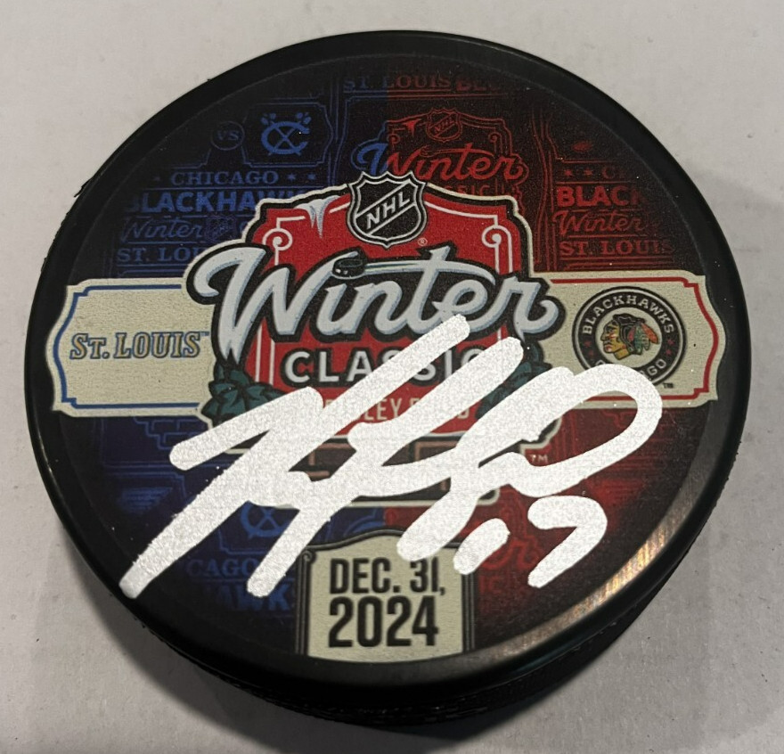 NICK FOLIGNO SIGNED CHICAGO BLACKHAWKS 2024 WINTER CLASSIC PUCK W/ CASE COA