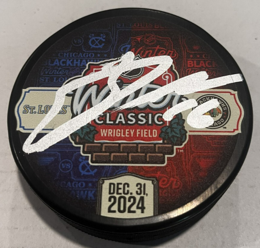 JASON DICKINSON SIGNED CHICAGO BLACKHAWKS 2024 WINTER CLASSIC PUCK W/ CASE COA
