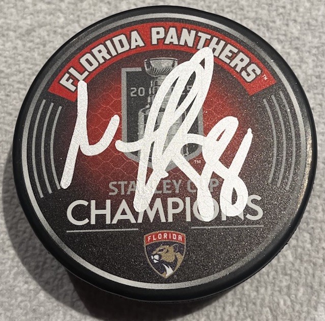 NATE SCHMIDT SIGNED FLORIDA PANTHERS 2025 STANLEY CUP HOCKEY PUCK W/ CASE COA