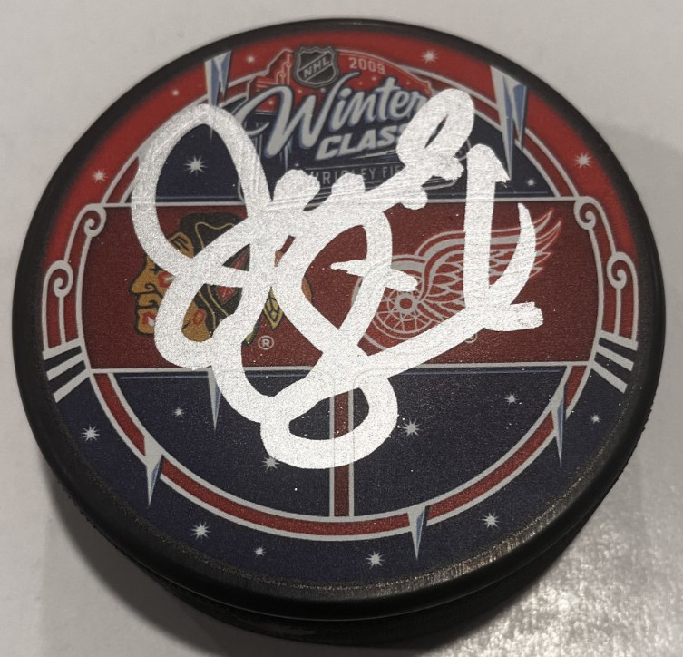 JOEL QUENNEVILLE SIGNED CHICAGO BLACKHAWKS 2009 WINTER CLASSIC PUCK W/ CASE COA