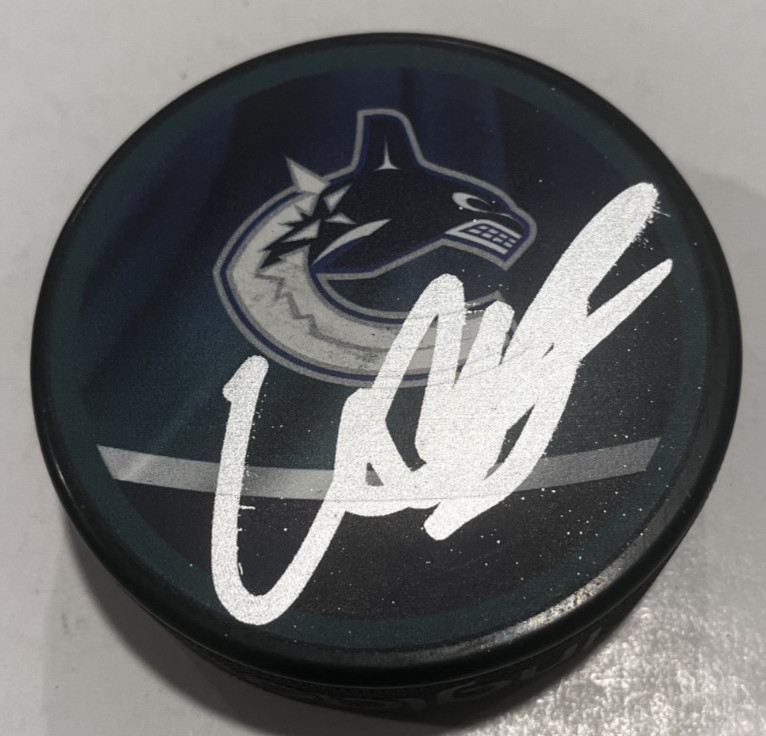 MARCIS PETTERSSON SIGNED VANCOUVER CANUCKS HOCKEY PUCK W/ CASE COA