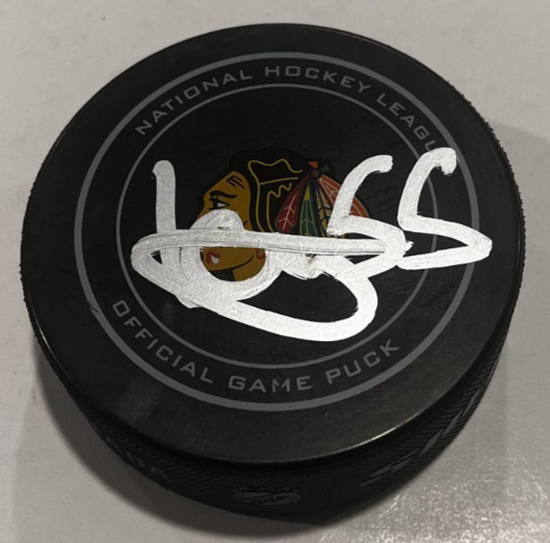 ARTYOM LEVSHUNOV SIGNED CHICAGO BLACKHAWKS OFFICIAL GAME HOCKEY PUCK W/ CASE COA