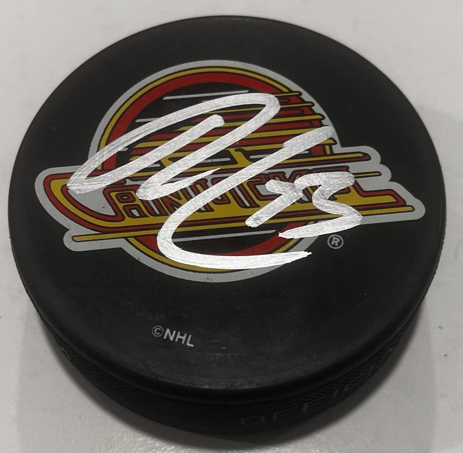 LUKAS REICHEL SIGNED VANCOUVER CANUCKS HOCKEY PUCK W/ CASE COA