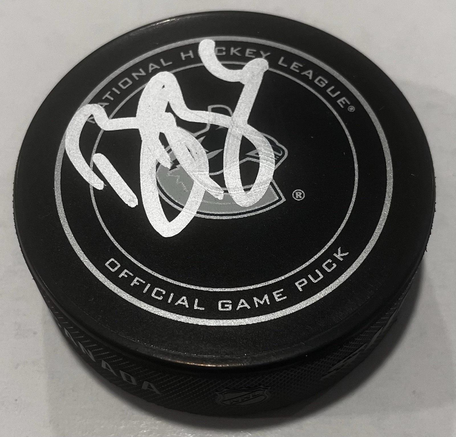 BROCK BOESER SIGNED VANCOUVER CANUCKS GAME HOCKEY PUCK W/ CASE COA