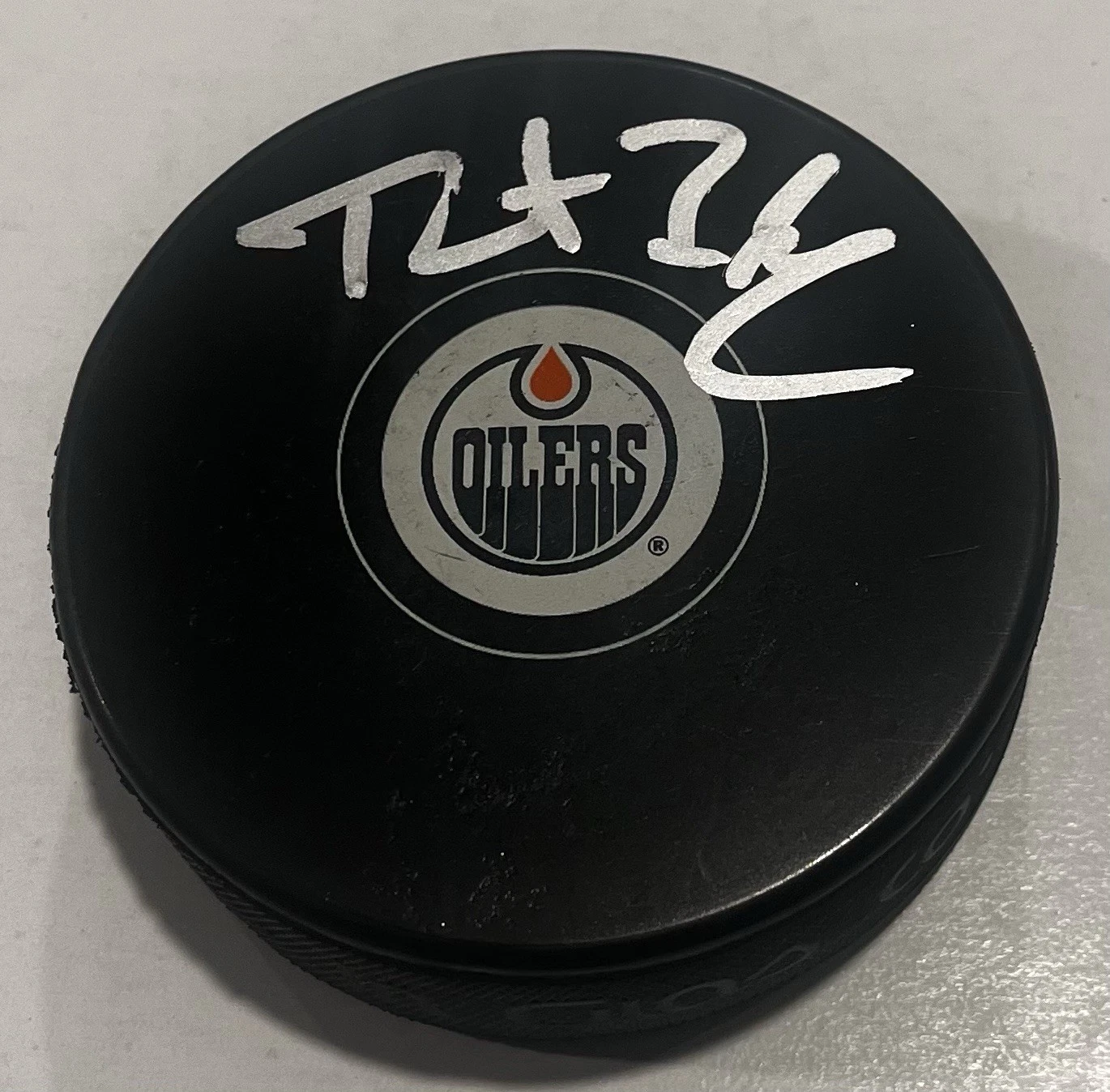 TRENT FREDERIC SIGNED EDMONTON OILERS HOCKEY PUCK W/ CASE COA