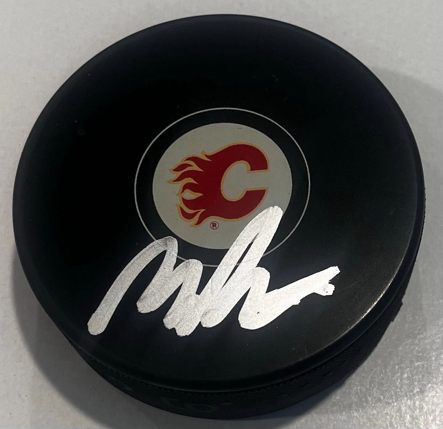 MORGAN FROST SIGNED CALGARY FLAMES HOCKEY PUCK W/ CASE COA