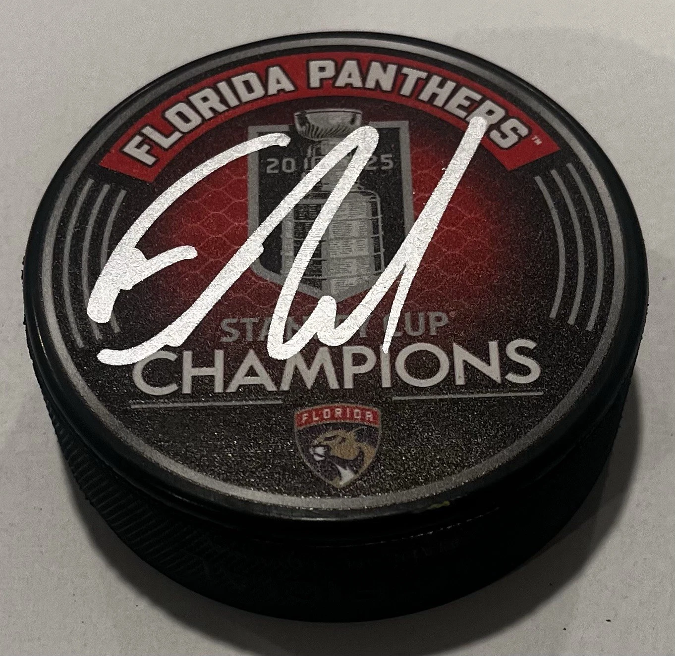 EVAN RODRIGUES SIGNED FLORIDA PANTHERS 2025 STANLEY CUP HOCKEY PUCK W/ CASE COA