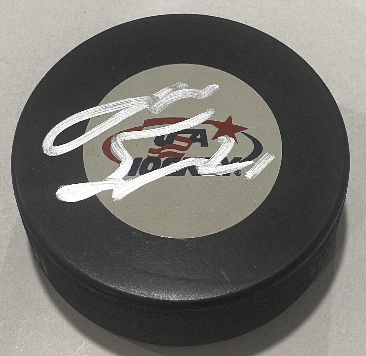 JIMMY SNUGGERUD SIGNED USA HOCKEY PUCK W/ CASE ST LOUIS BLUES COA