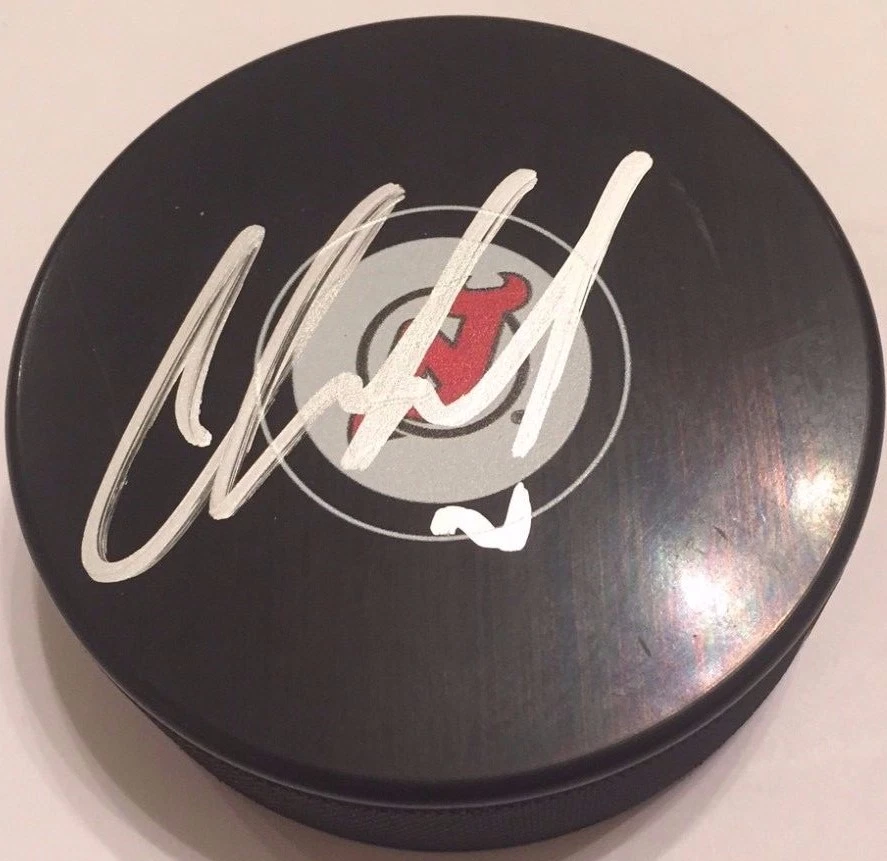 CORY SCHNEIDER SIGNED DEVILS HOCKEY PUCK W/CASE COA