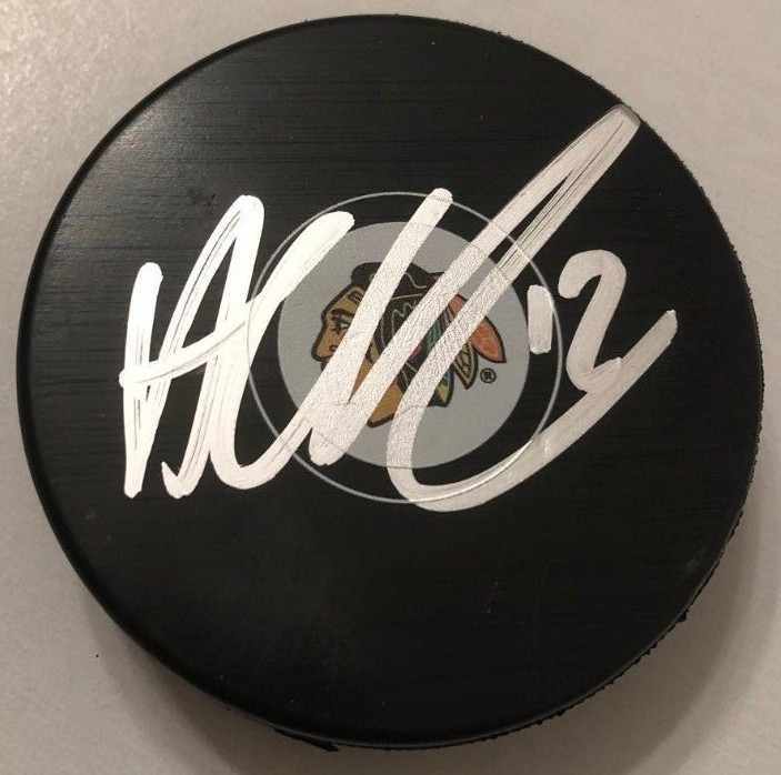 ALEX DEBRINCAT SIGNED CHICAGO BLACKHAWKS PUCK W/CASE COA