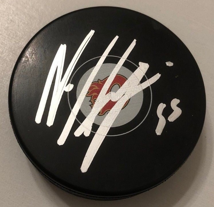 NOAH HANIFIN SIGNED CALGARY FLAMES PUCK W/CASE COA