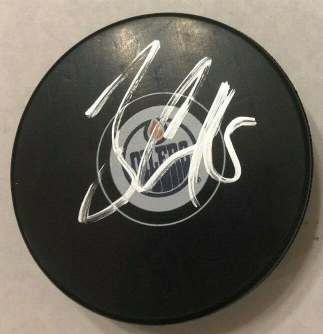 JAMES NEAL SIGNED EDMONTON OILERS HOCKEY PUCK W/ CASE COA