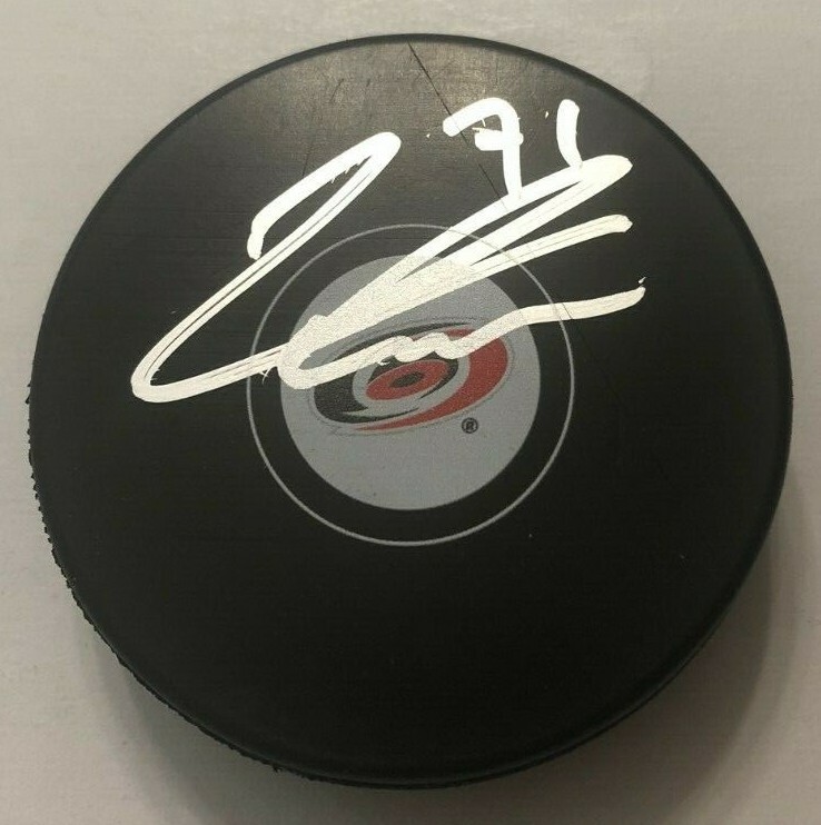 LUCAS WALLMARK SIGNED CAROLINA HURRICANES HOCKEY PUCK W/ CASE COA